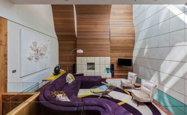 purple-stand-out-sofa-accent-wood-wall